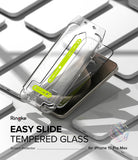 iPhone 15 Pro Max Screen Protector | Easy Slide Tempered Glass - iPhone 15 Pro Max Screen Protector - Clear installation frame with green slide tool hovering over a smartphone.