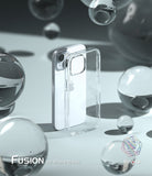 iPhone 15 Plus Case | Fusion - Clear protective case standing next to a white iPhone 15 Plus amidst floating glass spheres.