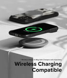 iPhone 15 Plus Case | Fusion-X Magnetic Matte Black - iPhone 15 Plus in a black case wirelessly charging on a pad.