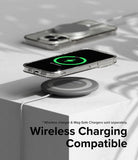 iPhone 15 Pro Case | Air - iPhone 15 Pro in a clear case wirelessly charging on a grey pad with a green charging icon displayed.