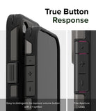 iPhone 15 Pro Case | Alles - Close-up of phone case buttons featuring tactile plus and minus symbols and fine aperture lines.