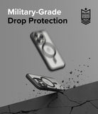 iPhone 15 Pro Case | Fusion Bold Magnetic - Two phone cases falling toward a cracked surface with military-grade text.