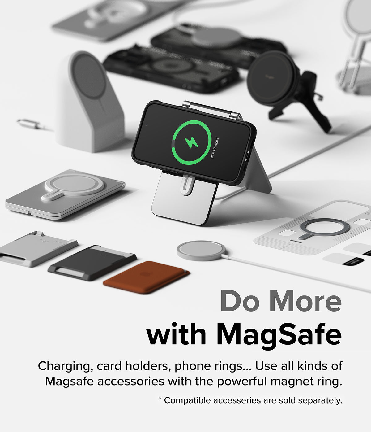 iPhone 15 Pro Case | Fusion-X Magnetic Matte Black - iPhone 15 Pro in a black case charging on a stand with various MagSafe accessories.
