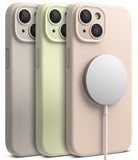iPhone 15 Plus Case | Silicone Magnetic - Three silicone iPhone 15 Plus cases in beige, light green, and pink with a MagSafe charger.