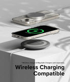 iPhone 15 Case | Air - Clear phone case on a wireless charging pad showing a green charging icon on the screen.