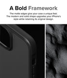 iPhone 15 Case | Fusion Bold - Close-up of a matte black phone case edge next to a textured, dark sand-like surface.