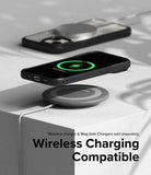 iPhone 15 Case | Fusion Bold - Black iPhone 15 in a protective case wirelessly charging on a circular pad with a green charging icon.