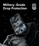 iPhone 15 Case | Fusion-X - Camouflage phone case on jagged rocks with military-grade drop protection text and badge.