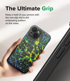 iPhone 15 Case | Onyx Design - Hand holding a black phone case with green and blue paint splatters and micro-dot side grip.
