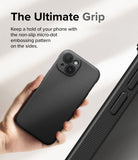 iPhone 15 Plus Case | Onyx Magnetic - Hand holding a black phone case with a textured micro-dot grip pattern on the side.
