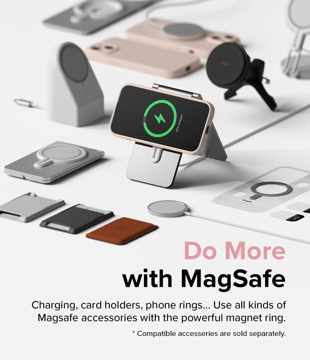 iPhone 15 Case | Silicone Magnetic - A pink iPhone 15 in a magnetic case charging on a stand surrounded by various MagSafe accessories.