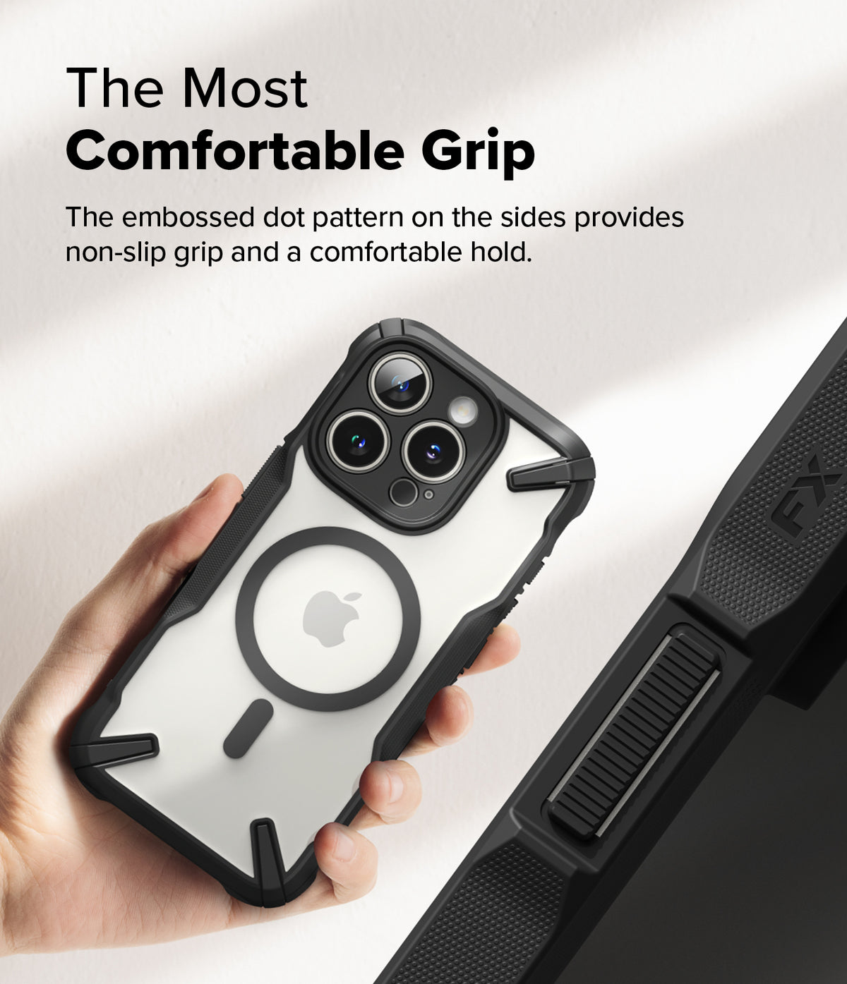 iPhone 16 Pro Max Case | Fusion-X Magnetic - Hand holding a clear phone case with a black frame and textured side grip.
