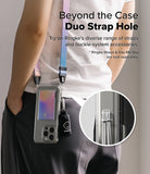 iPhone 16 Pro Max Case | Fusion Card - Person wearing a phone case with a card slot and colorful strap attached.
