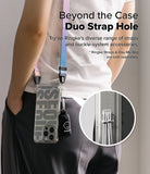 iPhone 16 Pro Max Case | Fusion Design - Person wearing a phone case with a colorful strap and a small bag attached.