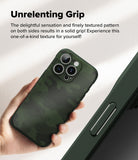 iPhone 16 Pro Max Case | Onyx - Hand holding a dark green camo-textured phone case with a close-up of the side grip pattern.