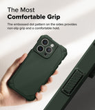 iPhone 16 Pro Max Case | Rugged Gear - Hand holding a dark green rugged phone case with textured side grips and dot pattern.