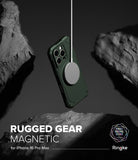 iPhone 16 Pro Max Case | Rugged Gear Magnetic - Green rugged phone case floating between rocks with a magnetic charger.