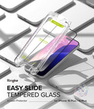 iPhone 16 Plus / 15 Plus Screen Protector | Easy Slide Tempered Glass - iPhone 16 Plus / 15 Plus Screen Protector - Clear installation frame hovering over an iPhone screen protector.