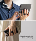 iPhone 16 Pro Cover | Folio Grip Wallet Magnetic - iPhone 16 Pro Cover - Person using a black folio wallet case with a finger strap for secure handling of the phone.