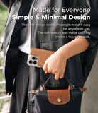iPhone & Pro MagSafe Cover | Folio Wallet Magnetic - Person in a leather jacket holding a brown folio phone case.