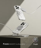 iPhone 16 Pro Case | Fusion Magnetic - Clear iPhone 16 Pro cases floating with magnetic chargers attached against a neutral background.