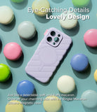 iPhone 16 Pro Case | Macaron Silicone Magnetic - Lavender silicone phone case surrounded by colorful macarons on blue.
