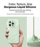 iPhone 16 Pro Case | Macaron Silicone Magnetic - Hand holding a sage green quilted silicone phone case with magnetic ring.