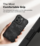 iPhone 16 Pro Case | Rugged Gear Magnetic - Hand holding a camo-patterned phone case with textured side grip details.