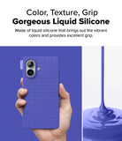 iPhone 16 Case | Bitmap Silicone Magnetic - Hand holding a purple grid-patterned silicone phone case beside liquid.