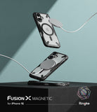 iPhone 16 Case | Fusion-X Magnetic - Two black Fusion-X cases floating above a pedestal, each charging with a magnetic disc.