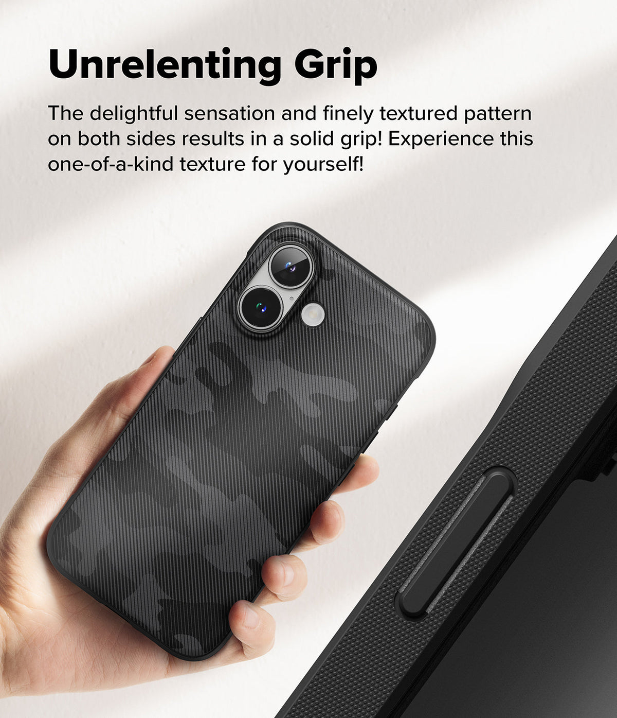 iPhone 16 Case | Onyx - A hand holds a black iPhone 16 case featuring a textured, dark camouflage pattern and a dual-camera cutout.