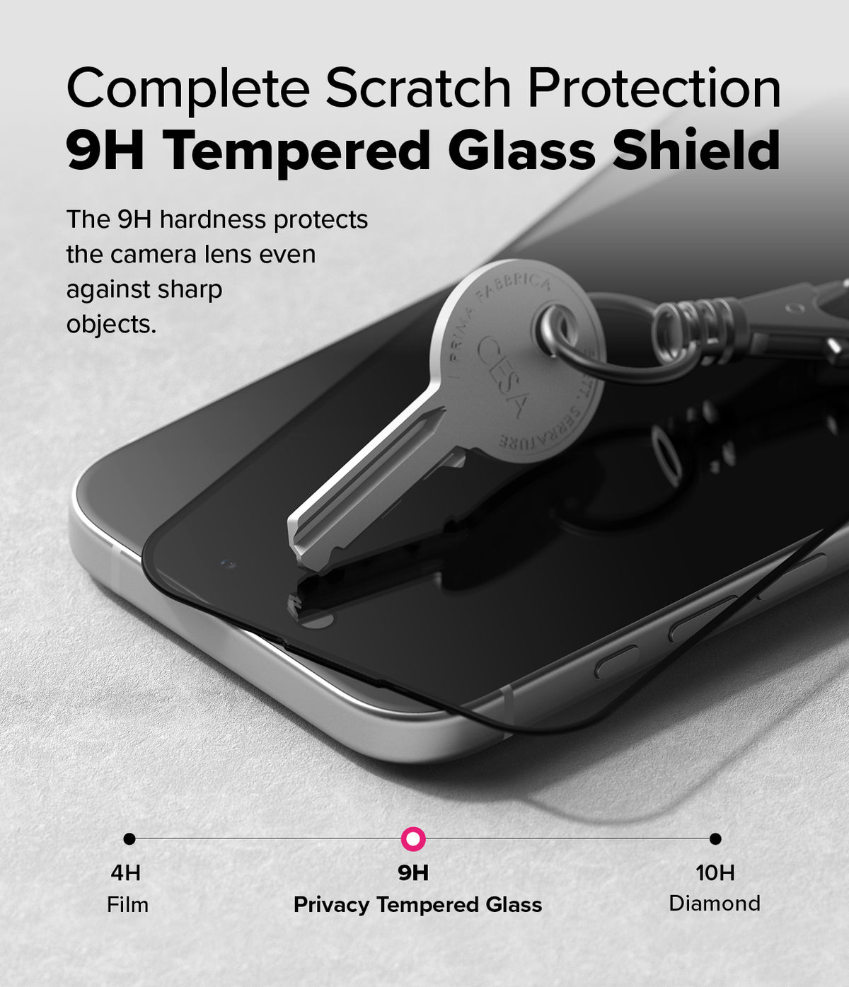iPhone 16 / 15 Screen Protector | Easy Slide Privacy Tempered Glass - iPhone 16 / 15 Screen Protector - A metal key scratches a 9H tempered glass screen protector on a smartphone.