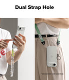 iPhone Air Case | Air - Clear phone case with dual strap holes, shown with a beaded wrist strap and a green crossbody lanyard.