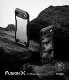iPhone Air Case | Fusion-X - Two black Fusion-X phone cases displayed on dark, textured volcanic rock.