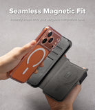 iPhone 17 Pro Max Cover | Folio Grip Wallet Magnetic - A hand attaching a clear MagSafe iPhone case to a black magnetic folio wallet.