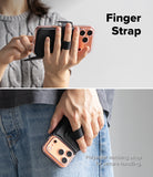iPhone 17 Pro Max Cover | Folio Grip Wallet Magnetic - Hands holding a phone case with a black polyester finger strap for secure grip.