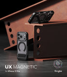iPhone 17 Pro Case | UX Magnetic - Two black magnetic phone cases with integrated kickstands displayed on industrial beams.