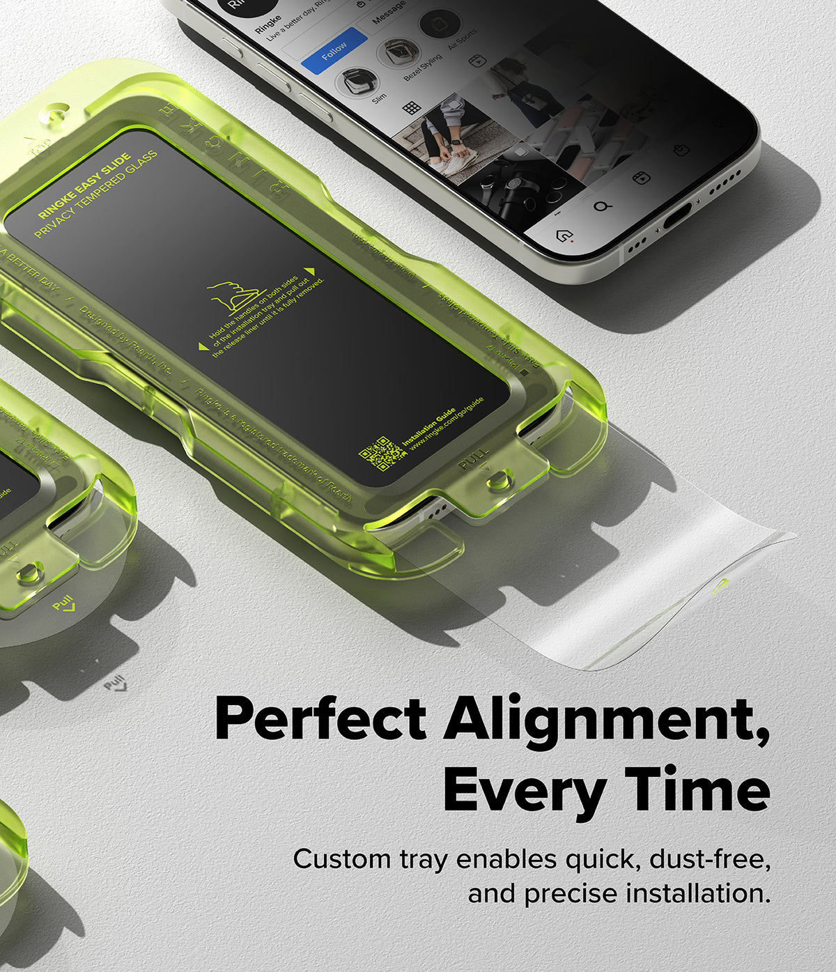 [Bundle] iPhone 17 | Onyx Magnetic - A smartphone inside a neon green installation tray for applying a privacy screen protector.