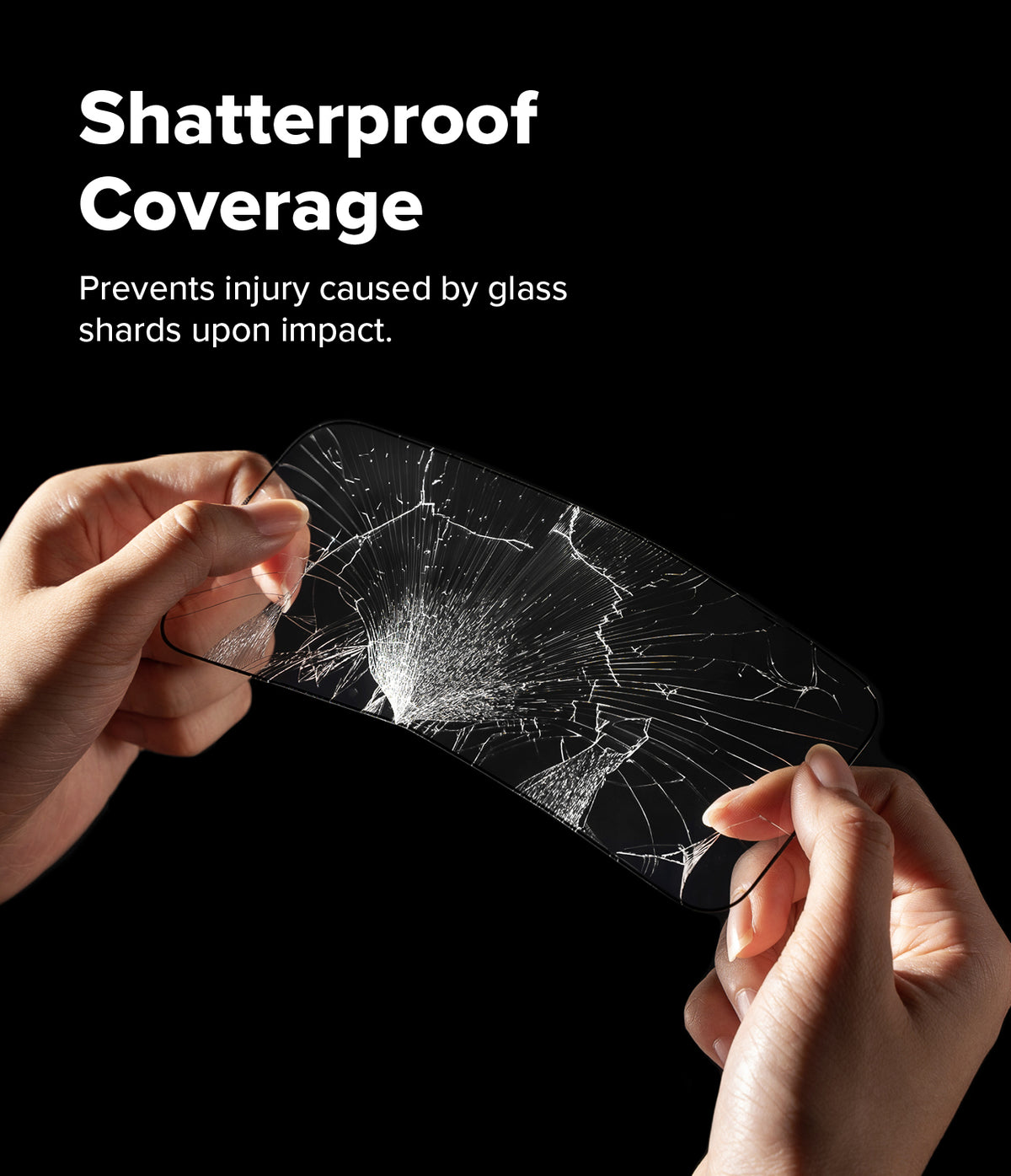 iPhone 17 Screen Protector | Easy Slide Tempered Glass - iPhone 17 Screen Protector - Hands holding a shattered tempered glass screen protector against a black background.