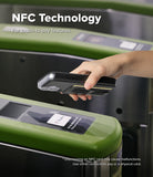 iPhone 16 Cover | Folio Grip Wallet Magnetic - Hand holding a phone in a black folio case over a subway turnstile reader.