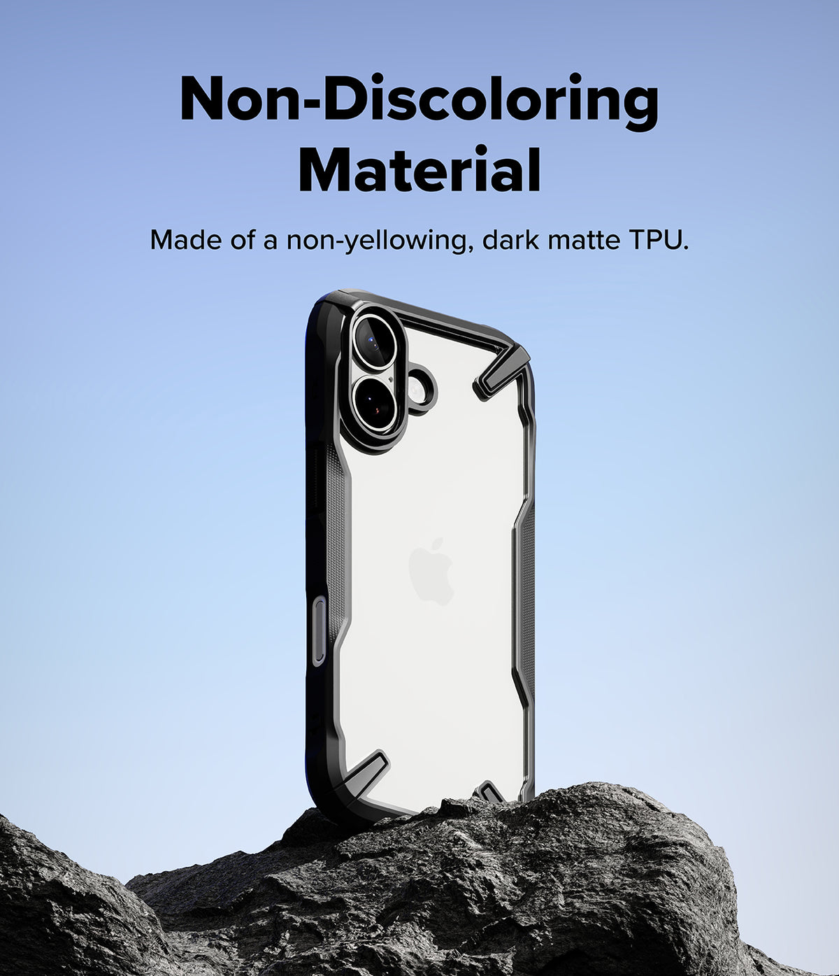 iPhone 17 Case | Fusion-X - Clear phone case with dark matte TPU edges standing on a rock against a blue sky background.