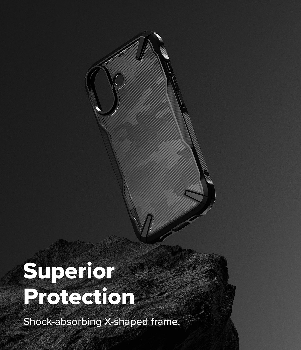 iPhone 17 Case | Fusion-X - Black camouflage phone case with a shock-absorbing X-shaped frame resting on a dark rock.