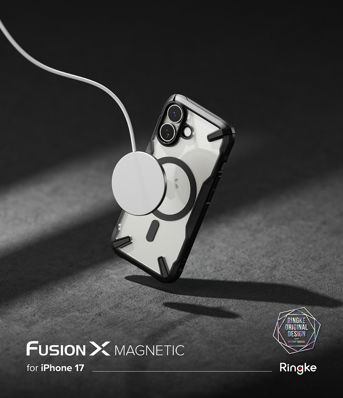[Bundle] iPhone 17 | Fusion-X Magnetic - Clear iPhone 17 case with black bumpers attached to a white magnetic charger.