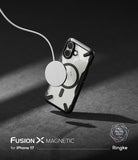 [Bundle] iPhone 17 | Fusion-X Magnetic - Clear iPhone 17 case with black reinforced corners attached to a magnetic charger.