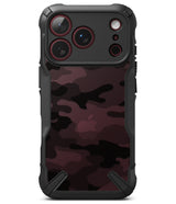 iPhone 18 Pro Max Case | Fusion-X - Two views of a rugged black phone case on a white background. The left case shows a gray and black camouflage pattern on the back, and the right case shows a dark interior with glowing blue light accents.