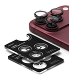 iPhone 18 Pro / 18 Pro Max Camera Protector | Camera Lens Frame Glass (2 Pack) - Ringke camera lens frame glass protector set shown on a silver smartphone, with two black lens protectors attached and the retail box beside them on a white background.