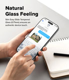 iPhone 18 Pro / Pro Max Protectors - Person holding a smartphone with a clear screen protector, text 'Natural Glass Feeling' above.