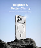 iPhone 18 Pro Case | Fusion Magnetic - A clear MagSafe-compatible phone case shown on a smartphone, standing on dark rocks against a blue sky background. White text at the top reads 'Brighter & Better Clarity' and says to showcase the device's original design.
