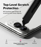 iPhone Duo Camera Protector | Camera Lens Frame Glass (2 Pack) - Close-up of a smartphone showing the rear camera area with text reading 'Top-Level Scratch Protection' and '9H hardness layer keeps off scratches from sharp objects.' A stylus is touching the camera lens area to demonstrate protection.