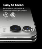 iPhone Duo Camera Protector | Camera Lens Frame Glass (2 Pack) - Close-up of a smartphone showing two circular camera lens protectors applied to the rear camera module, with marketing text reading 'Easy to Clean' and icons for True Touch and Anti-Fingerprint on a black background.